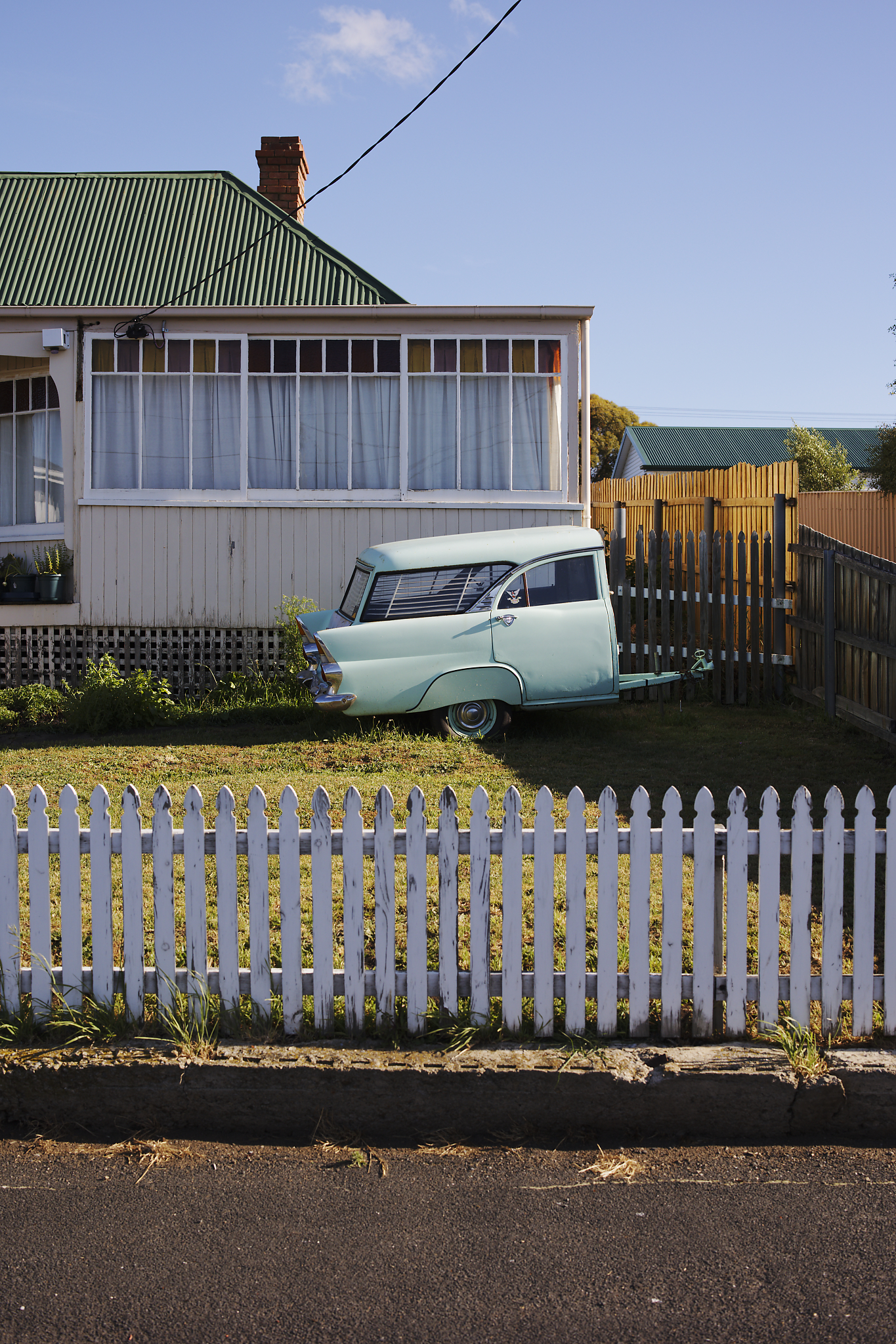 This image was a classic drive-by decision. If I don’t stop to shoot, will I regret it? I decided I would. With the late afternoon sun diffused by haze, I was keen to see what shadow detail I could retrieve whilst keeping the colours true. I used the reflective qualities of the weatherboard siding to help capture the pastel shades and great tonal range in colour. It made for a crisp and spring-appropriate composition.
I like shooting high contrast situations, and the Canon EOS R6 and 50mm lens meant I could easily shoot highlights while still capturing the shadows. Using the wide-open RF 50mm f/1.2L USM lens also meant I could move quickly – helpful, as I was standing in the middle of the road.